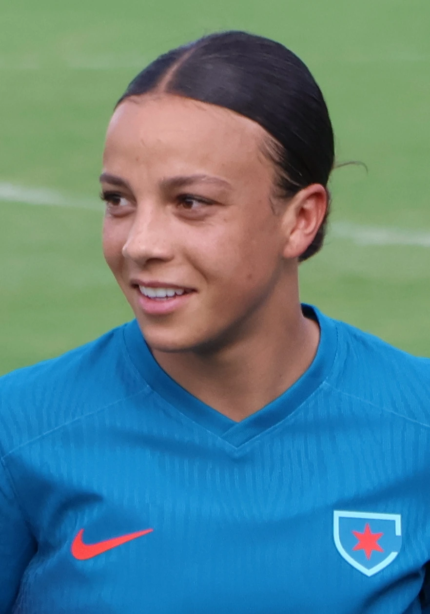Mallory Swanson in a blue Chicago Red Stars jersey on the field