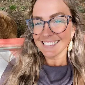 Portrait photo of Meredith Steele smiling outdoors